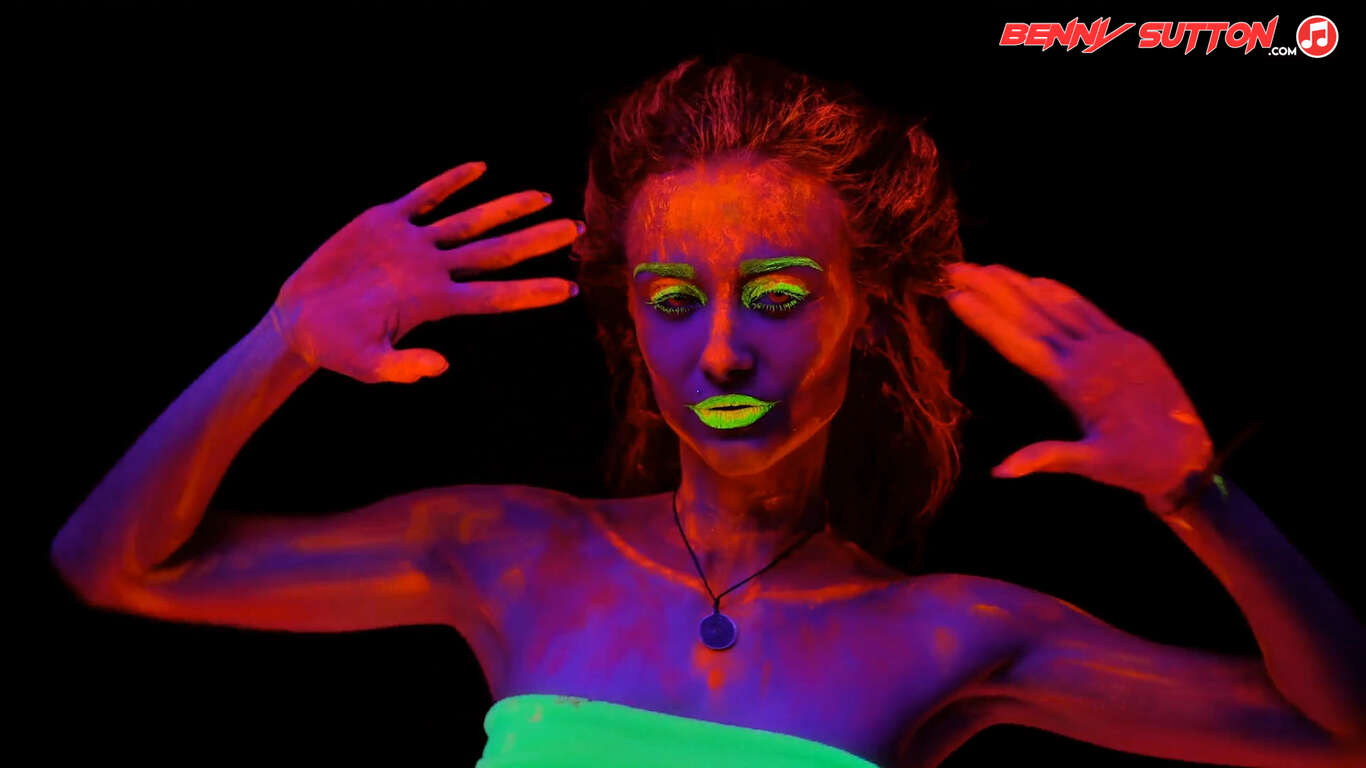 rave girl in black light